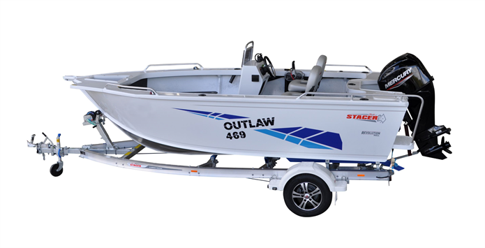 stacer outlaws range small white boat on a trailer